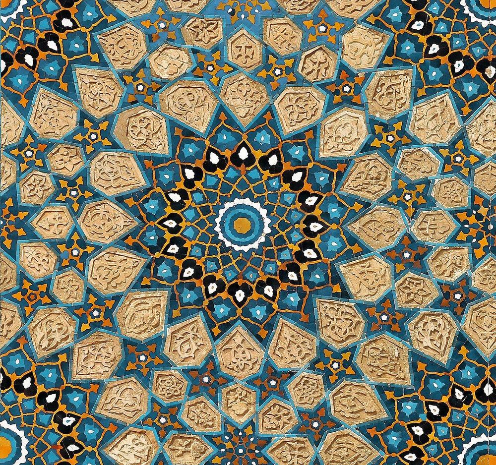 Glazed tilework on a madrasa facade at the Registan, Samarkand.